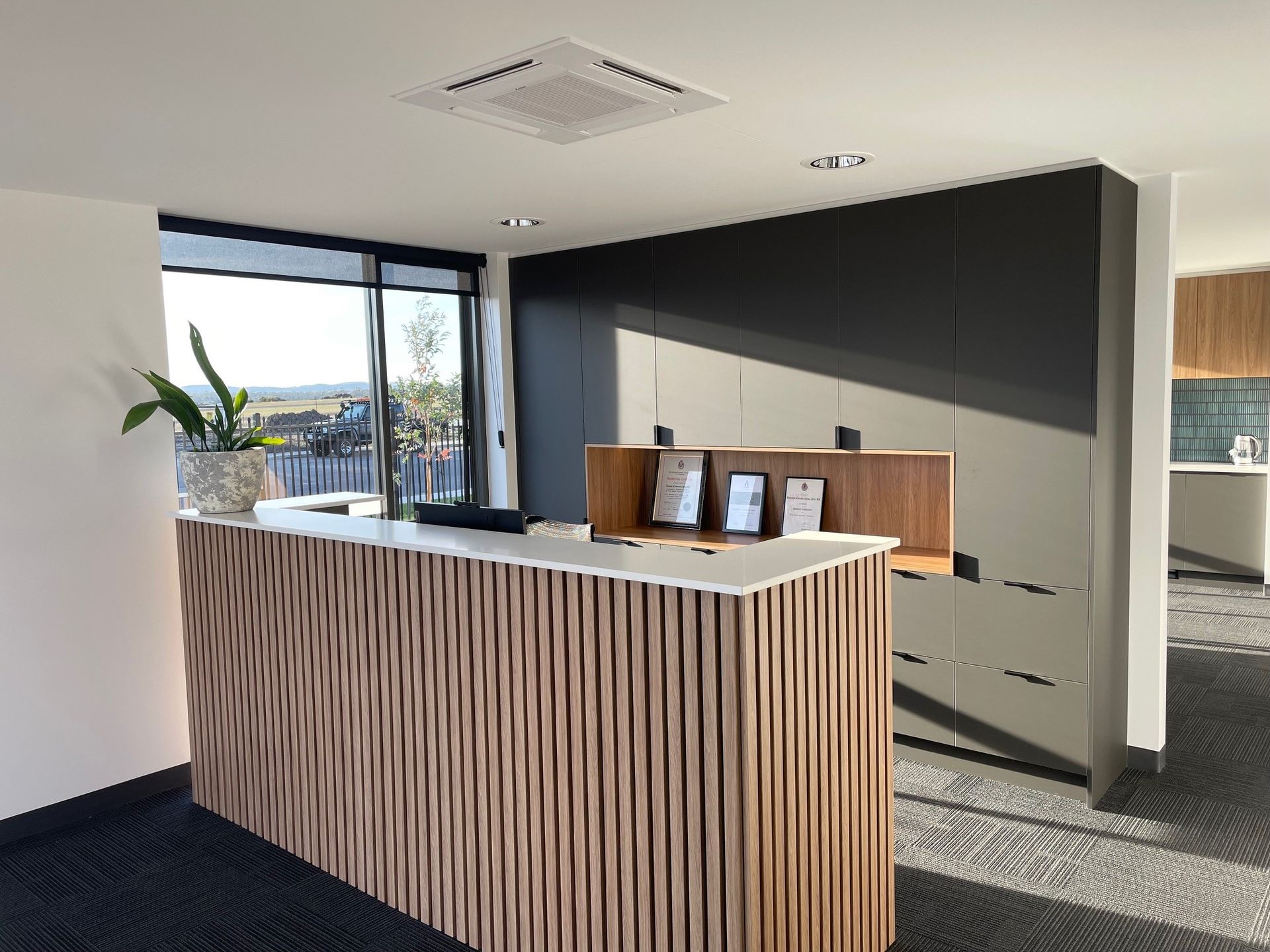 There Is A Large Wooden Counter In The Middle Of The Room – Cambridge, TAS - Bennett Construction (TAS)