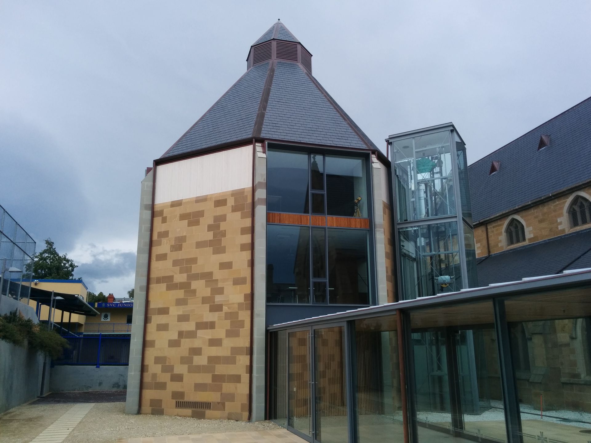 A Large Building With A Pyramid Shaped Roof – Cambridge, TAS - Bennett Construction (TAS)