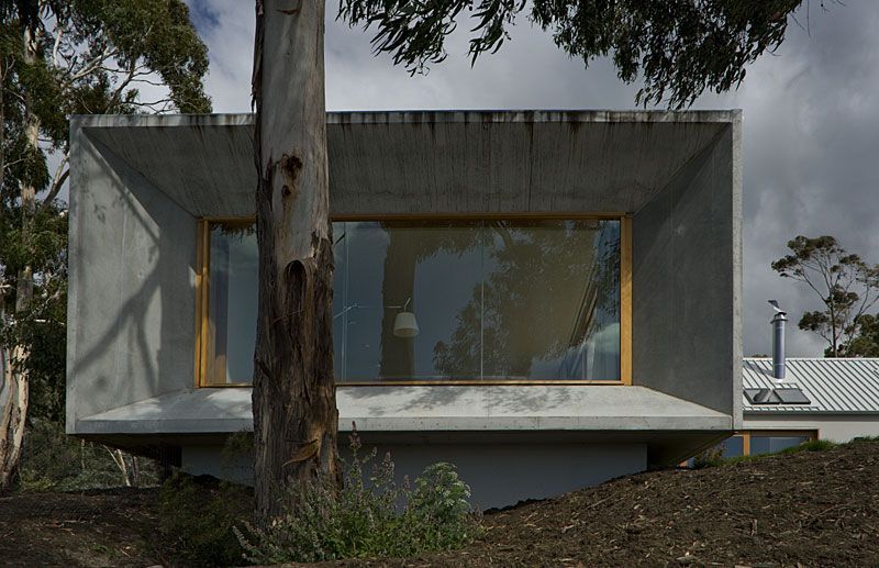 A House With A Large Window And A Tree In Front Of It – Cambridge, TAS - Bennett Construction (TAS)