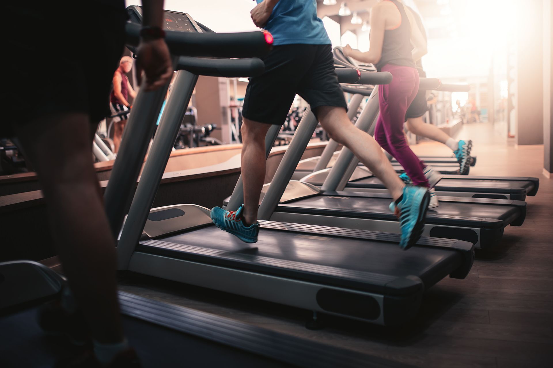 People Running on Treadmill