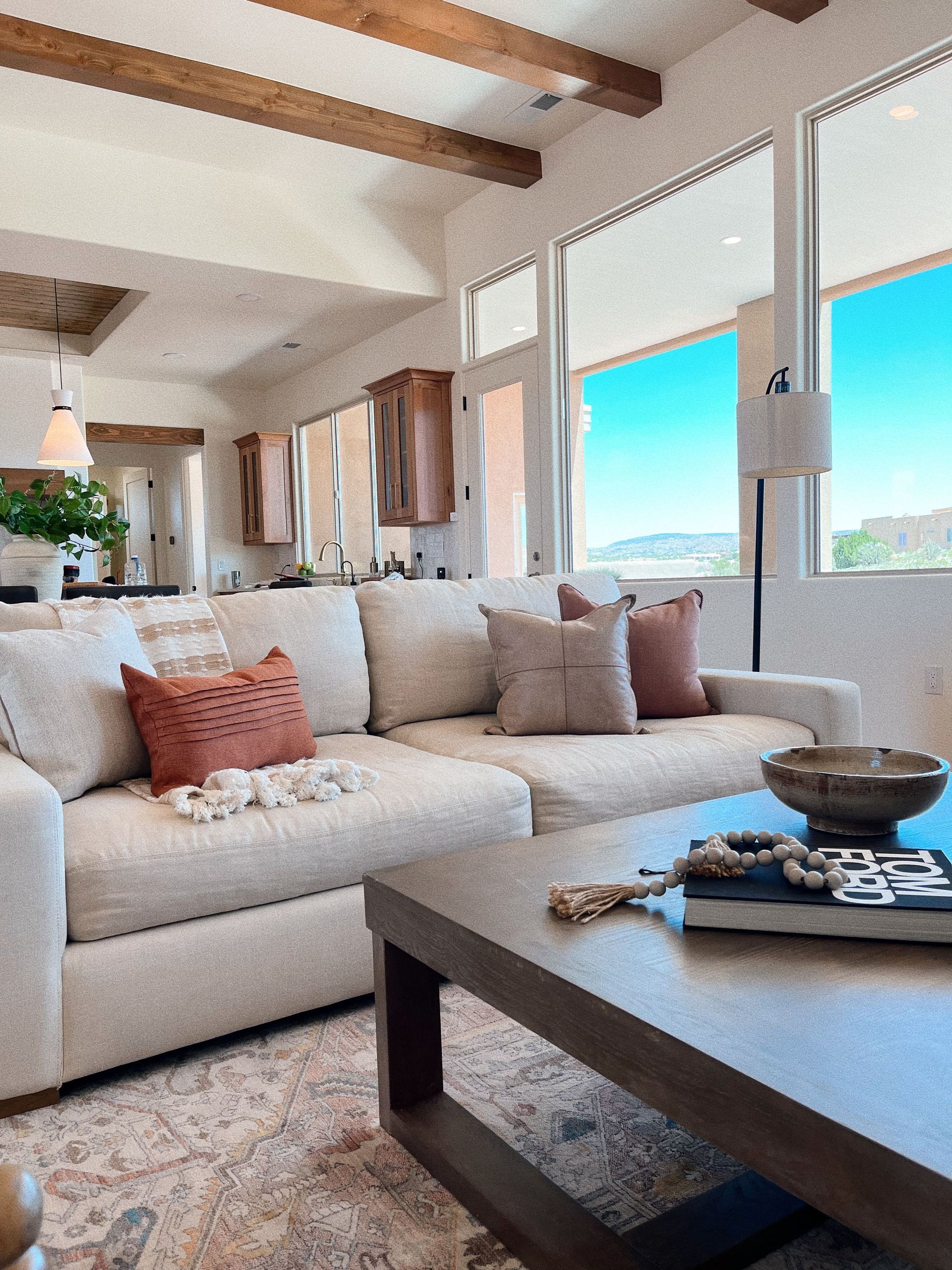 A living room with a couch and a coffee table