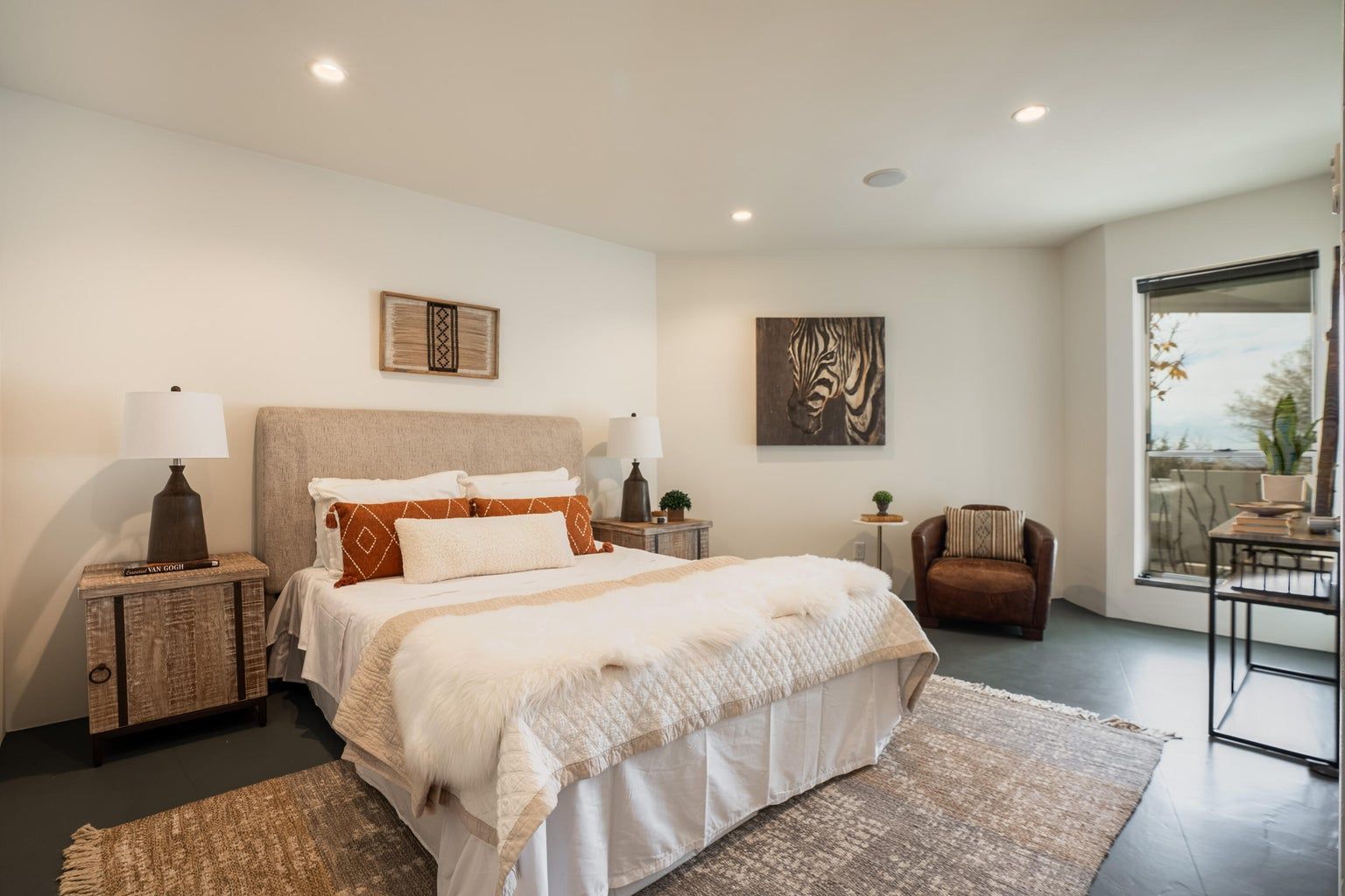 There is a large bed in the middle of the room.