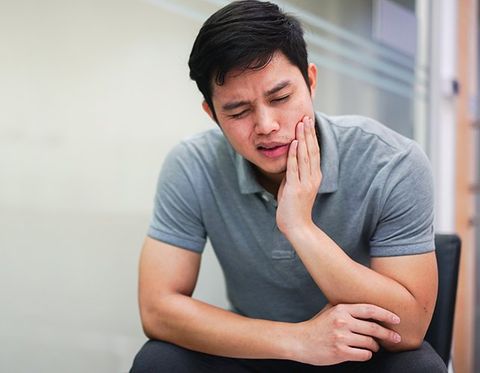 Man Feeling Hurt From Toothache — Clarkston, MI — Mark Frenchi DDS
