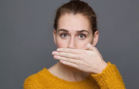 Woman Covering Her Mouth — Clarkston, MI — Mark Frenchi DDS