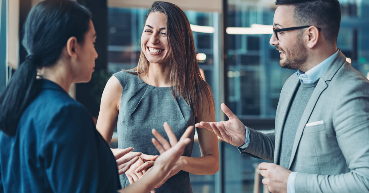 A group of business people are networking.