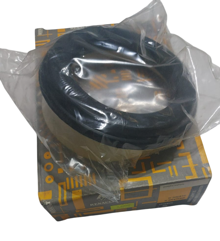 Sello industrial de color negro y beige en embalaje de plástico sobre caja de color amarillo y negro.