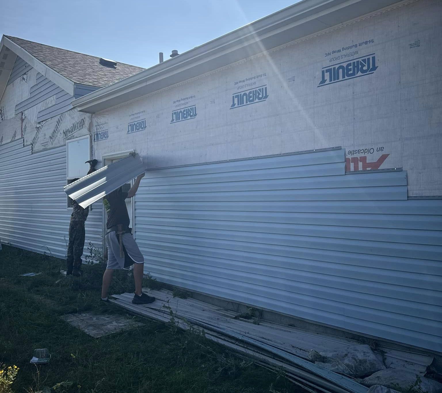 process of replacing house siding