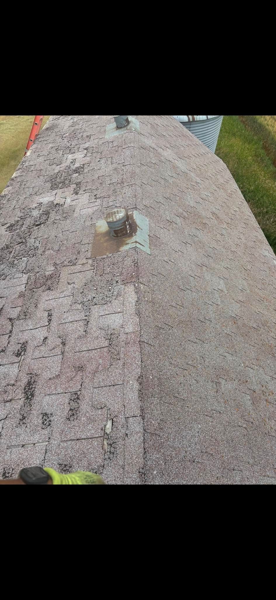 sever hail damage to a residential roof
