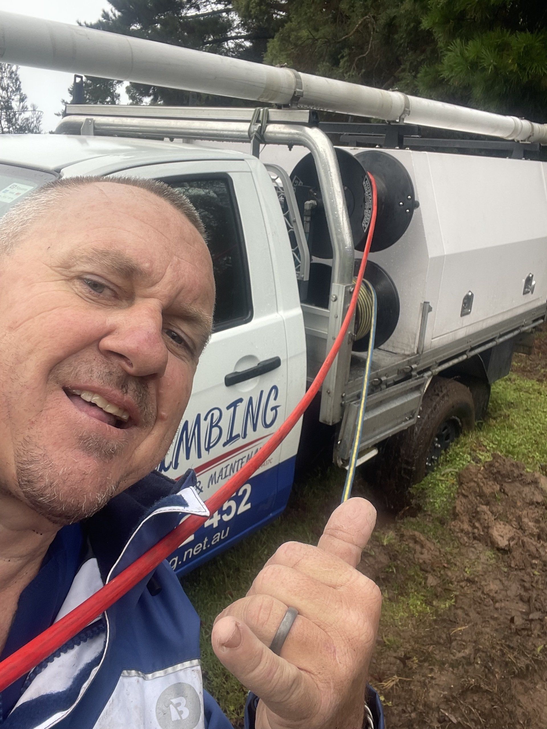 Plumber Installing Water Filter — Plumbers in Central Coast, NSW