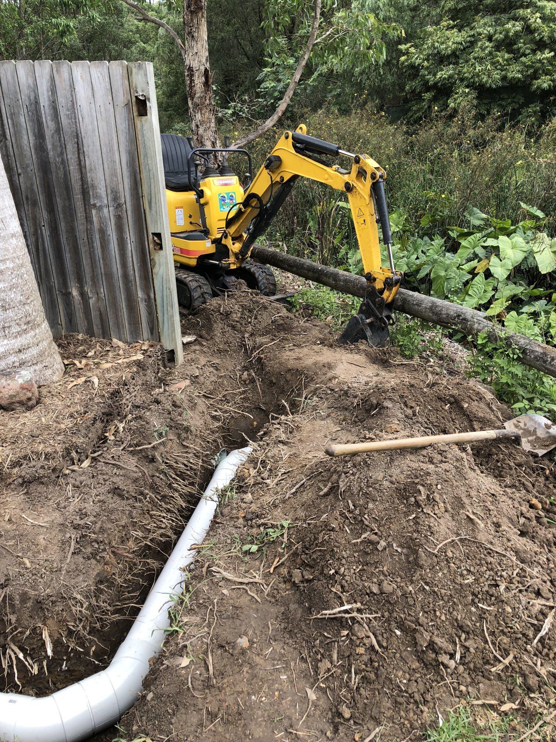 Excavator Digging Up Backyard — Tight Access Excavation in Central Coast, NSW