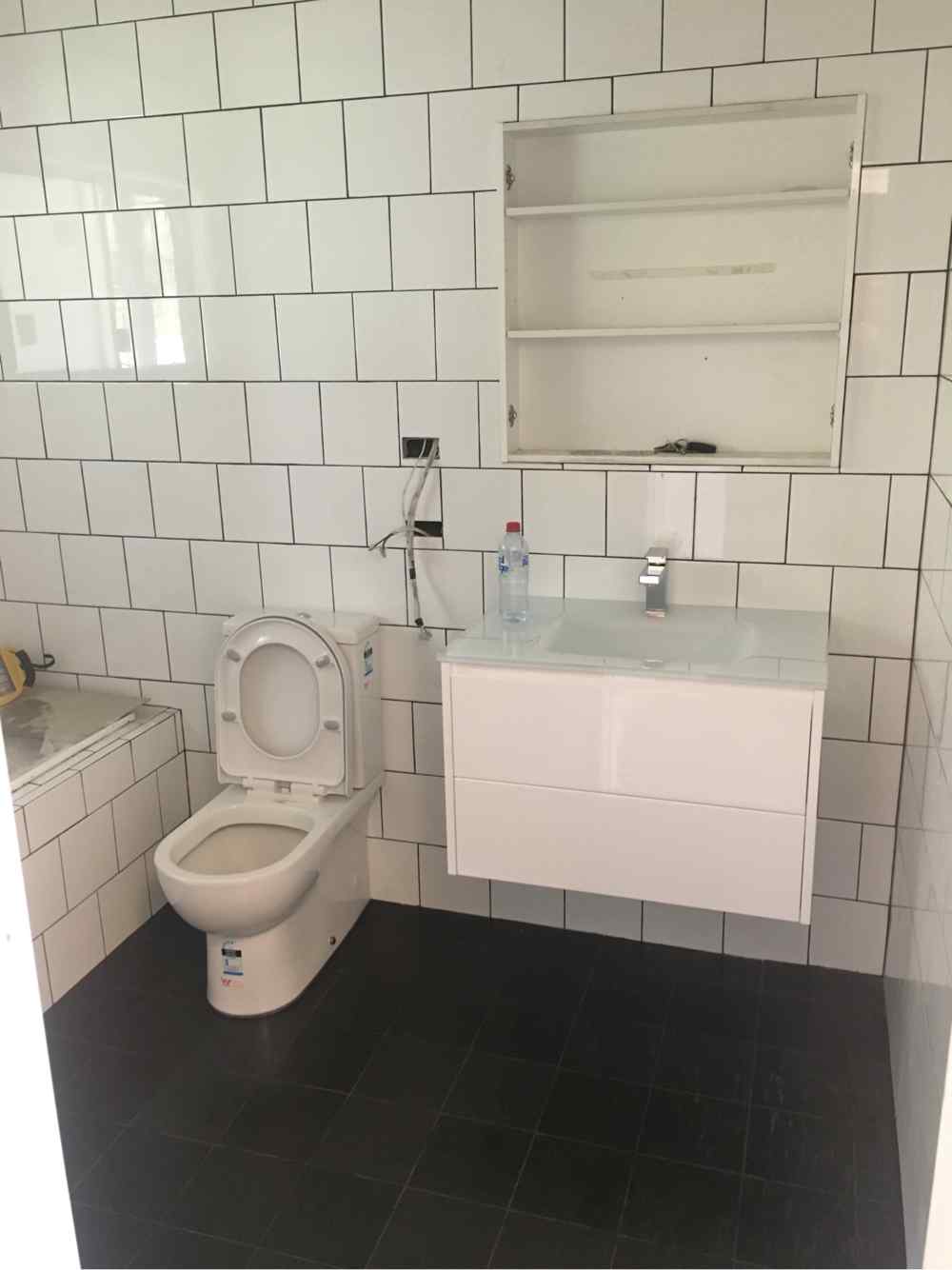 Installing New Pipes In Bathroom — Plumbers in Central Coast, NSW