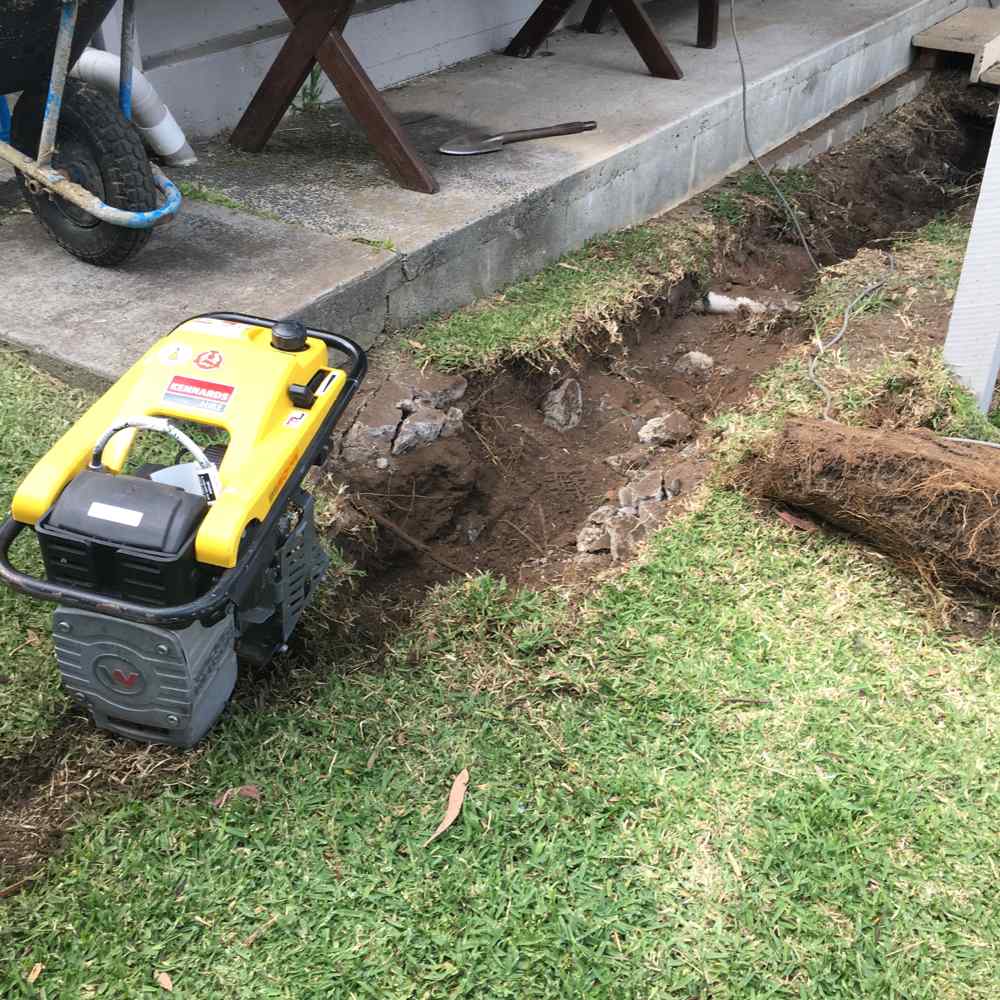 Digging Up Ground To Inspect Pipes — Plumbers in Central Coast, NSW