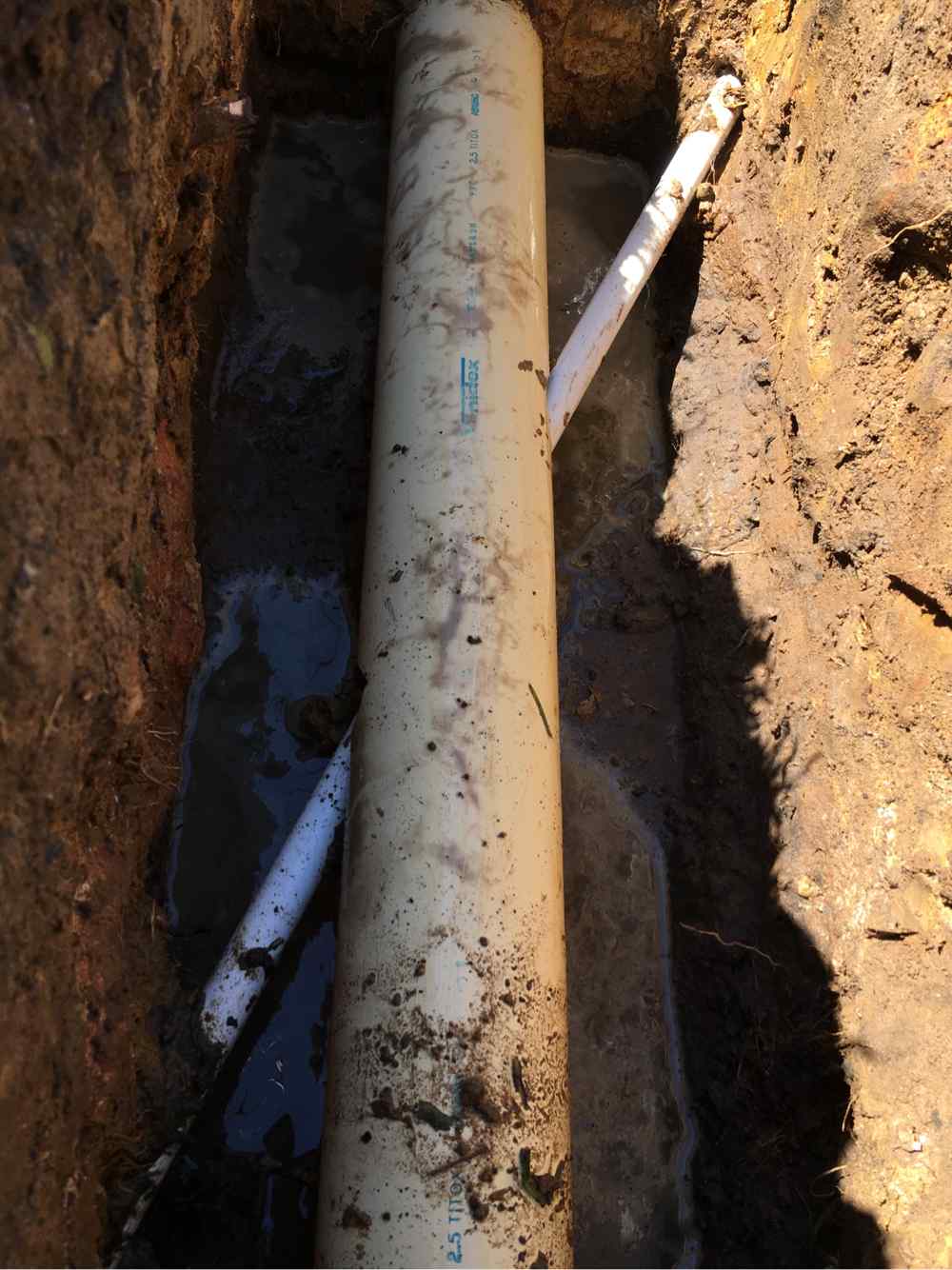 Digging Up Underground Pipes — Plumbers in Central Coast, NSW