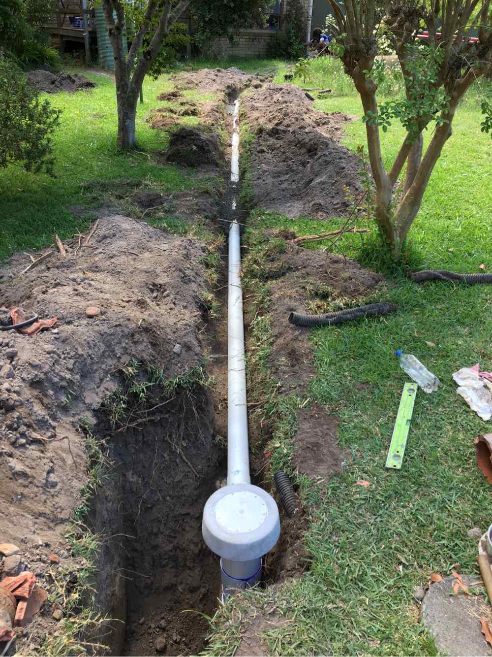 Installing New Pipes Underground — Plumbers in Central Coast, NSW