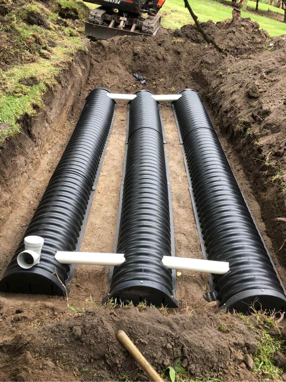 Black Underground Pipes — Plumbers in Central Coast, NSW