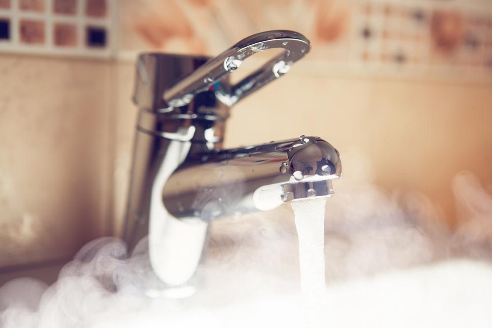 Hot Water Coming From A Tap