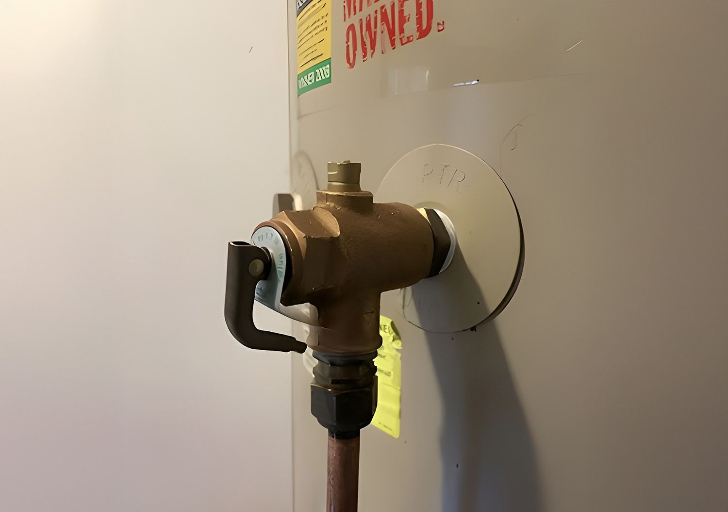 Water Heater With Valve Connected To A Copper Pipe