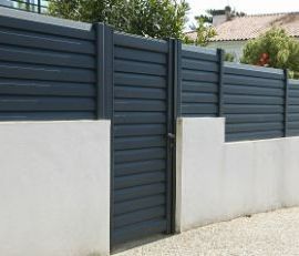 Residential home with a newly built colorbond fences and colorbond gates in Melville, for safety purposes.