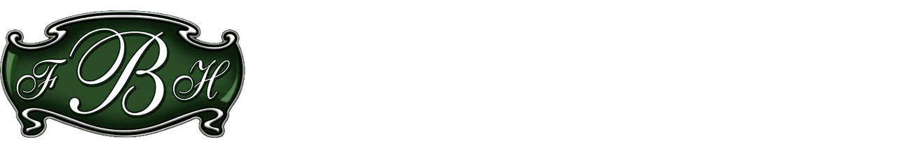 A dark green, decorative emblem featuring the ornate, interconnected white letters 