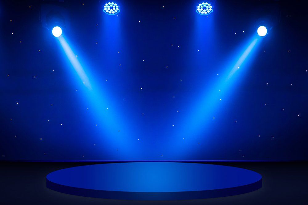 Blue Round Stage Under Concert Lighting — Knoxville, TN — True Grip & Lighting, Inc.