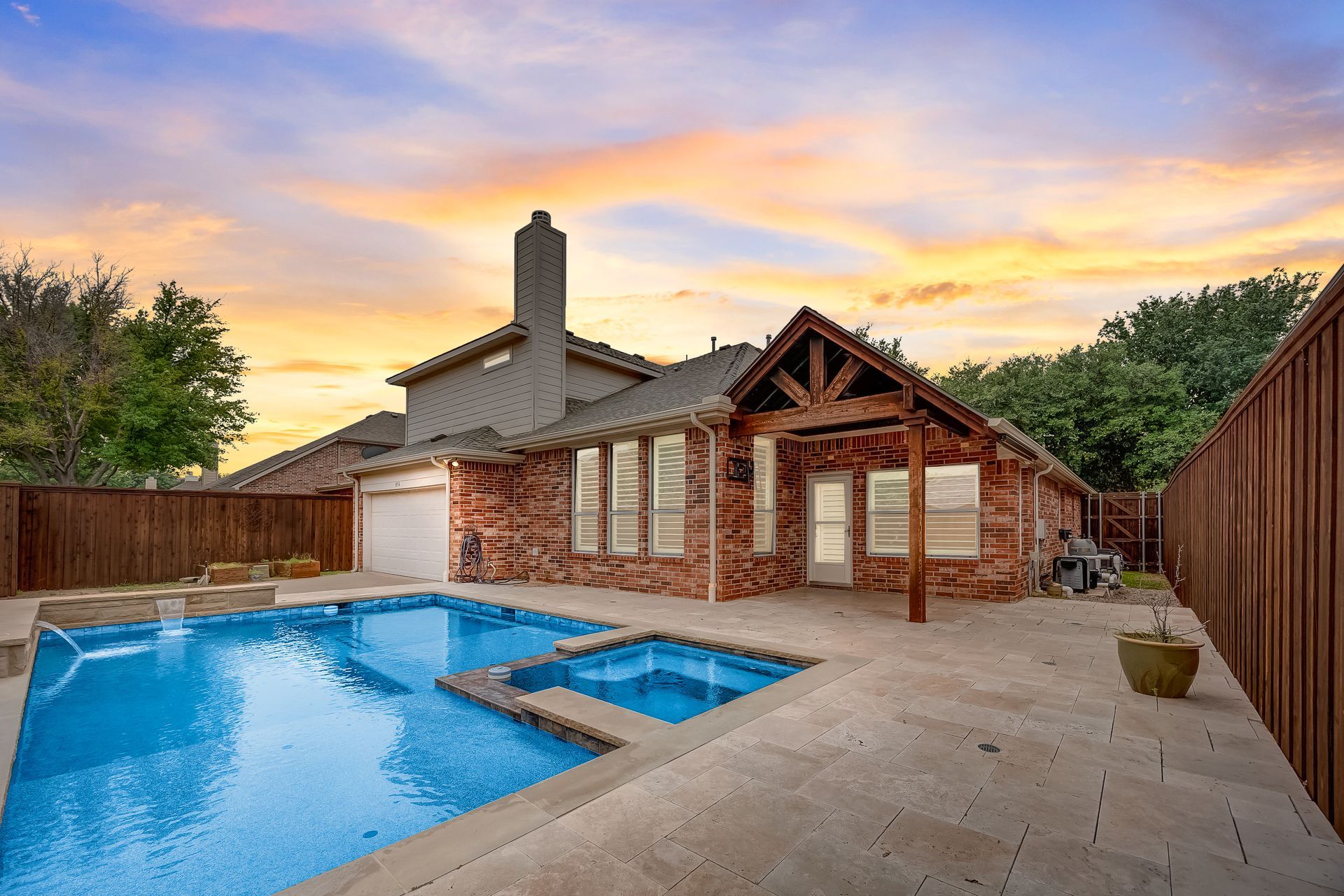 A living room filled with furniture and a fireplace.