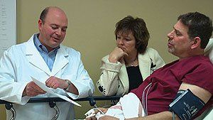 Cancer Screening — Doctor Explaining To Patient in Louisville, KY