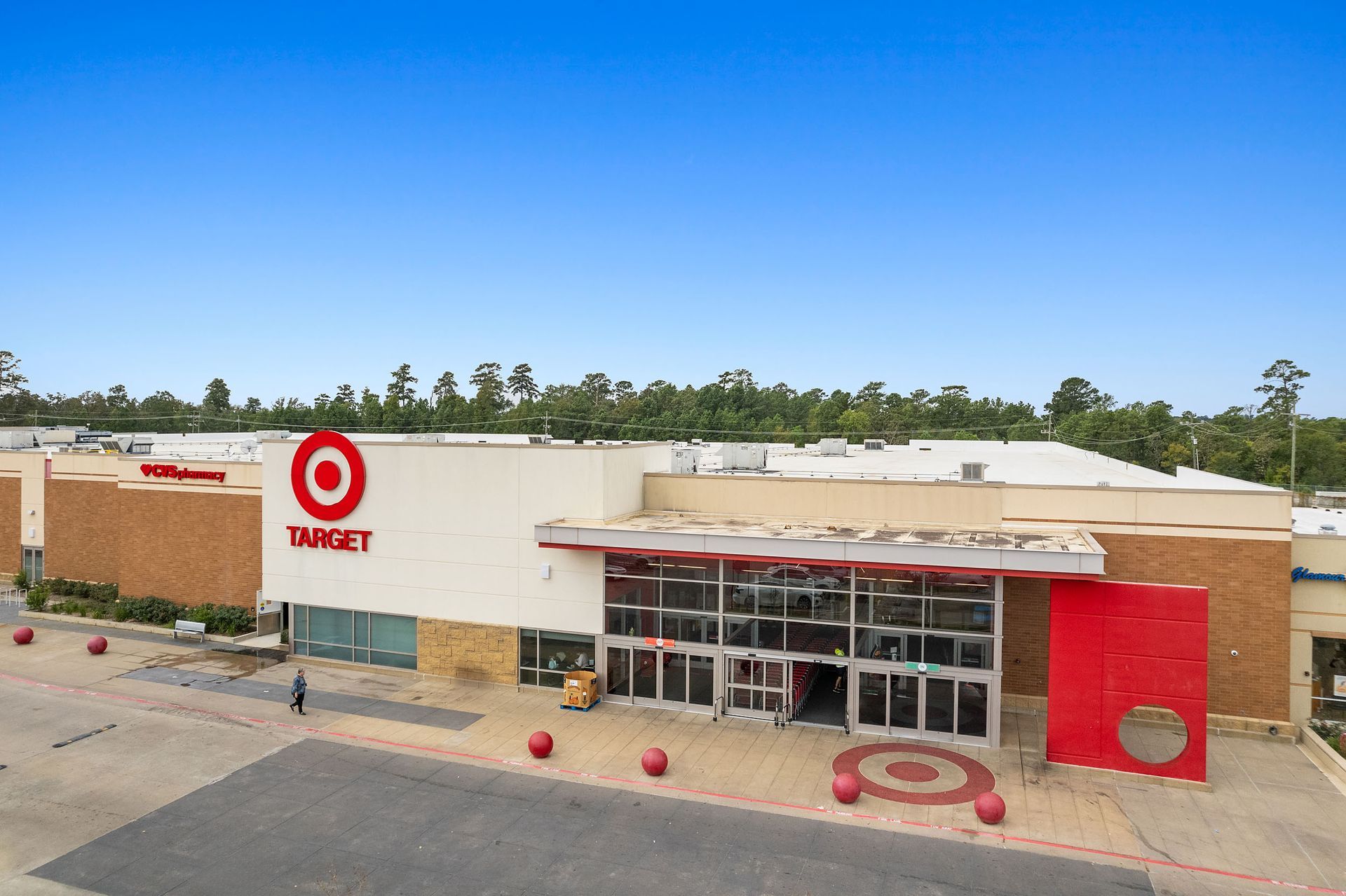 An aerial view of a Target store with a blue sky in the background mear The Heights offers student apartments for rent near SHSU in Huntsville, TX.