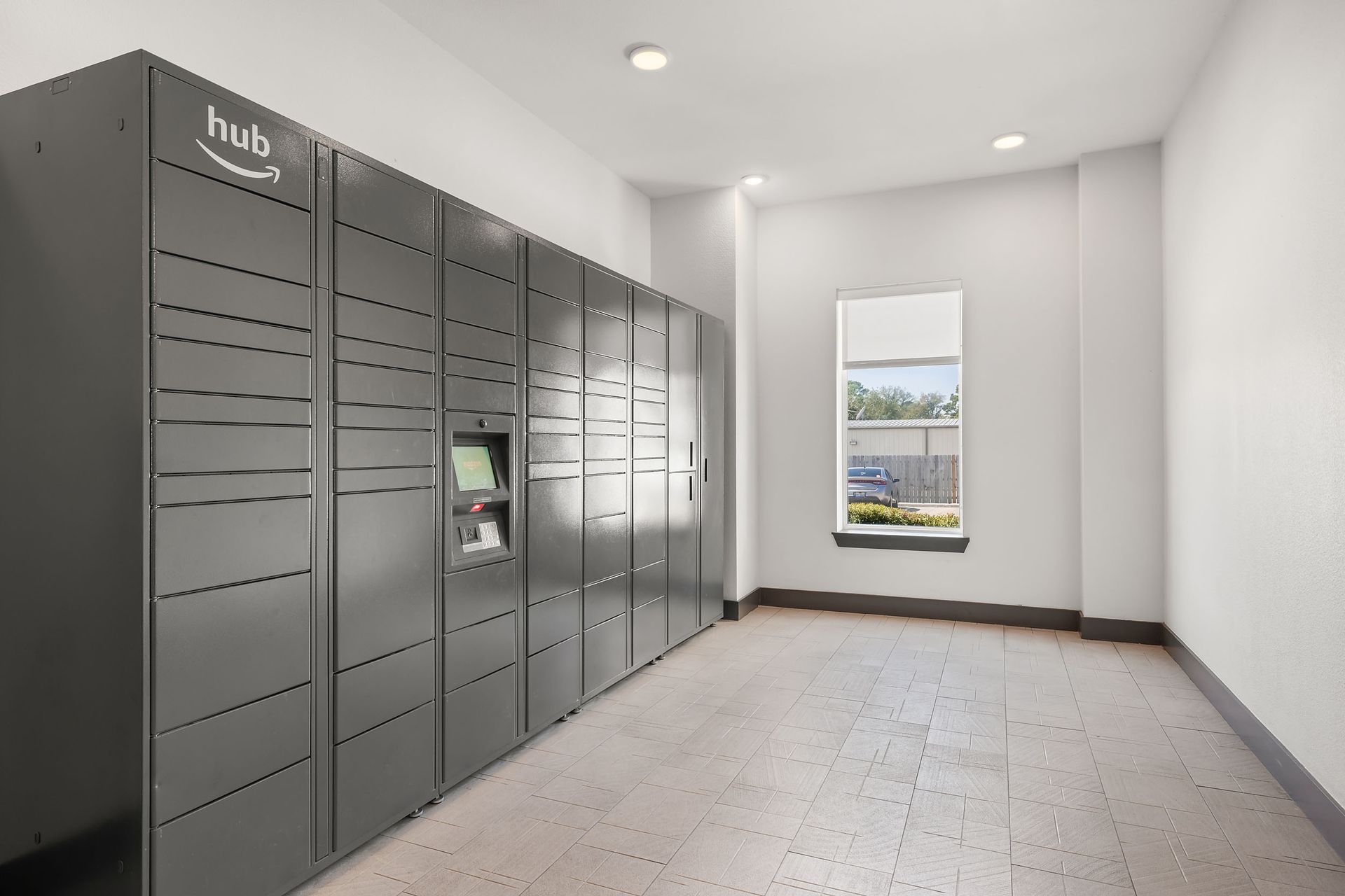 Apartment community package locker with a lot of lockers at The Heights offers student apartments for rent near SHSU in Huntsville, TX.