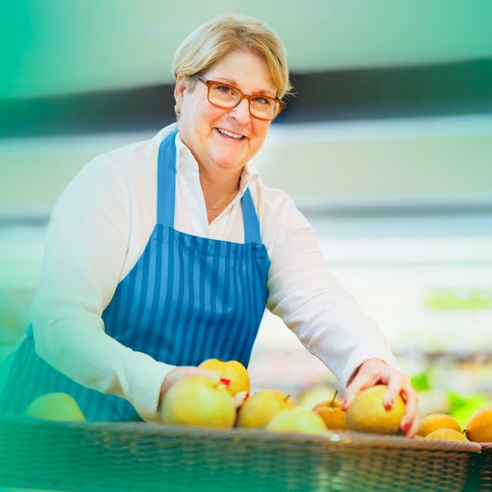Country Store clerk stocking food