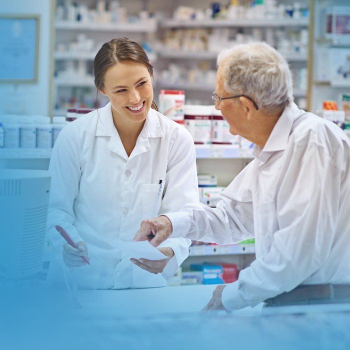 Pharmacist assisting Country Store and Pharmacy customer