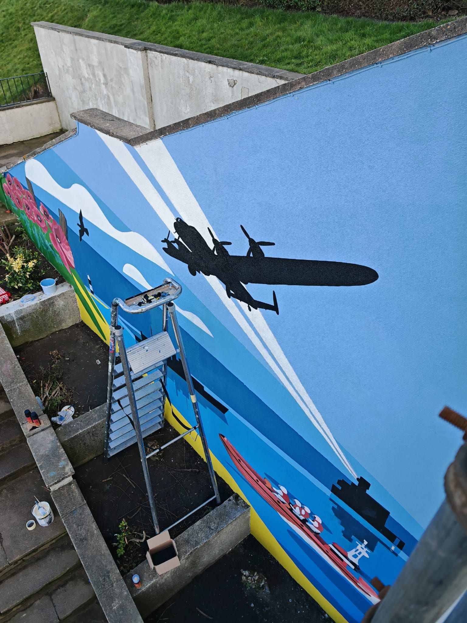 A painting of a plane flying over a body of water