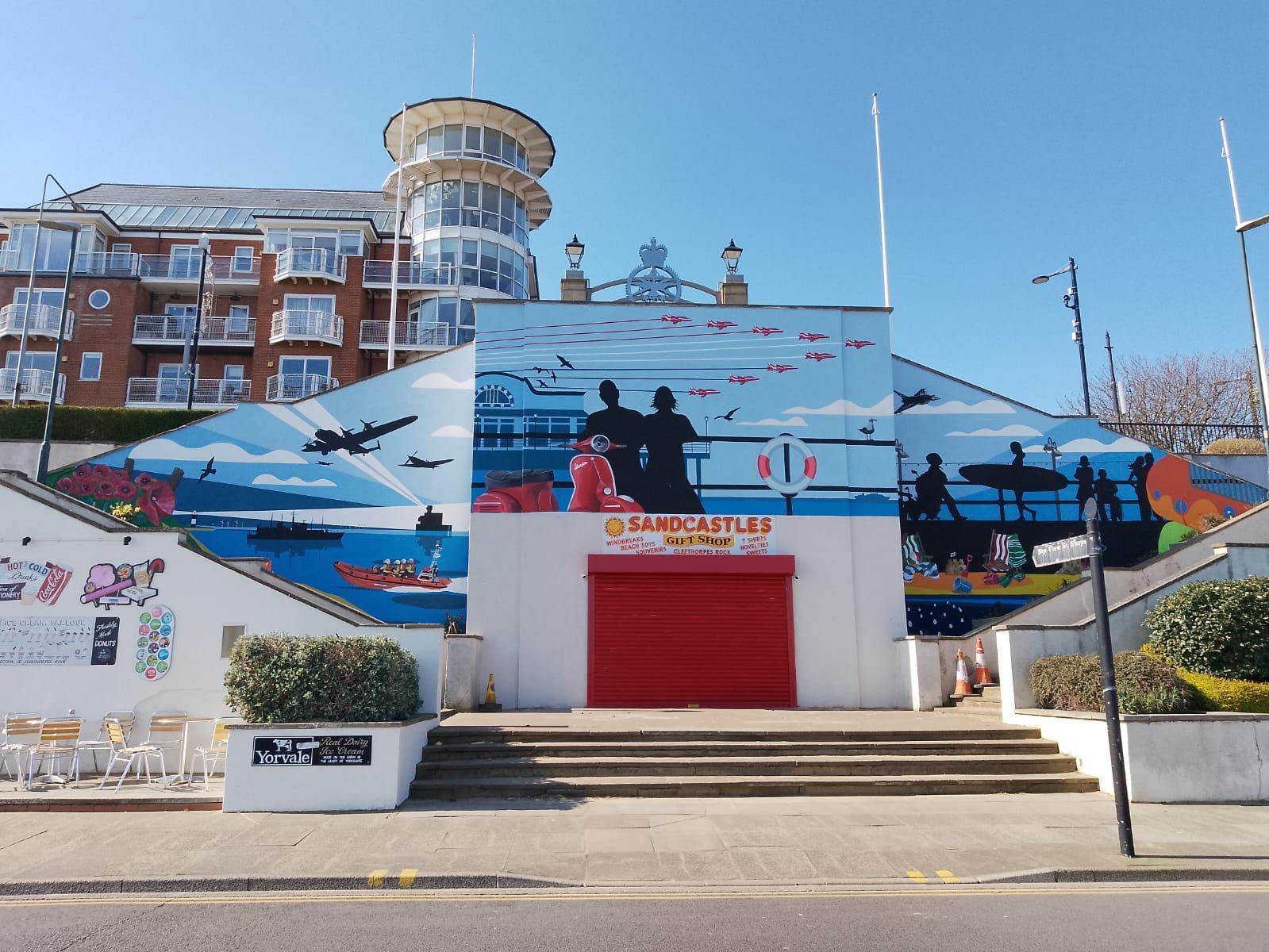 A building with a large mural on the side of it