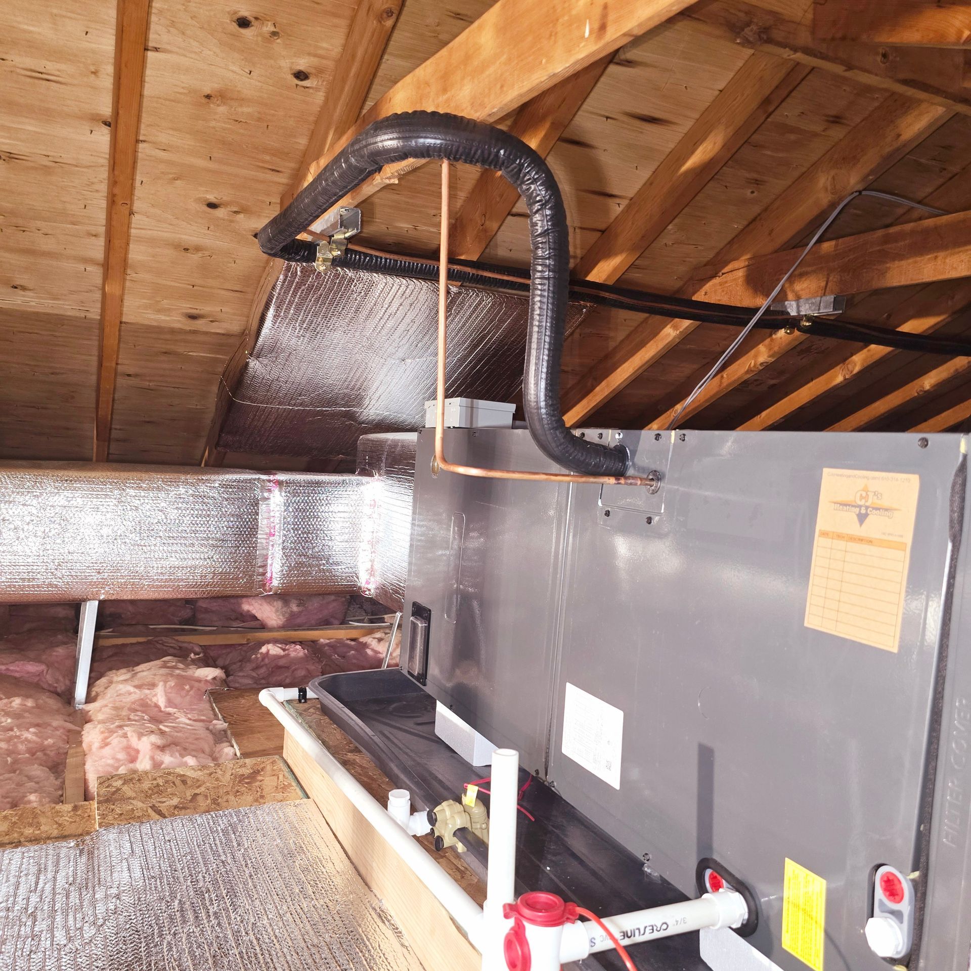 A gray box with a copper pipe attached to it