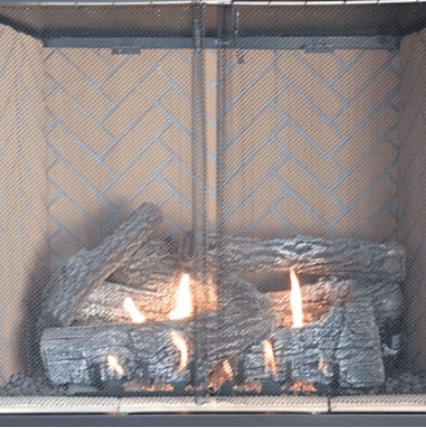 A fireplace filled with logs and fire