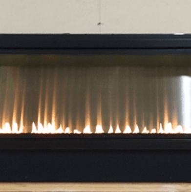 A fireplace with a lot of flames coming out of it