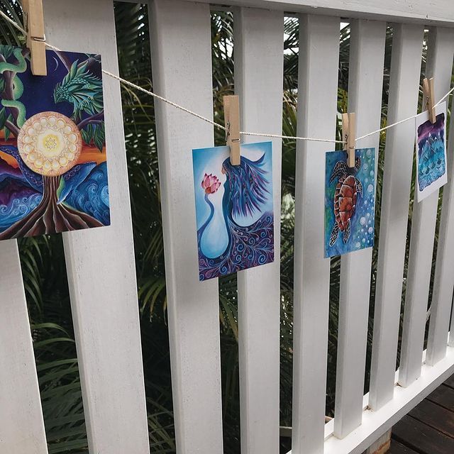 Art Prints Pegged On Fence — Printing Services in the Byron Bay Region, NSW