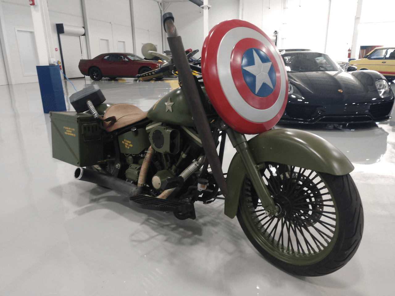 A motorcycle with a captain america shield on it