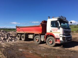 White truck with red trailer