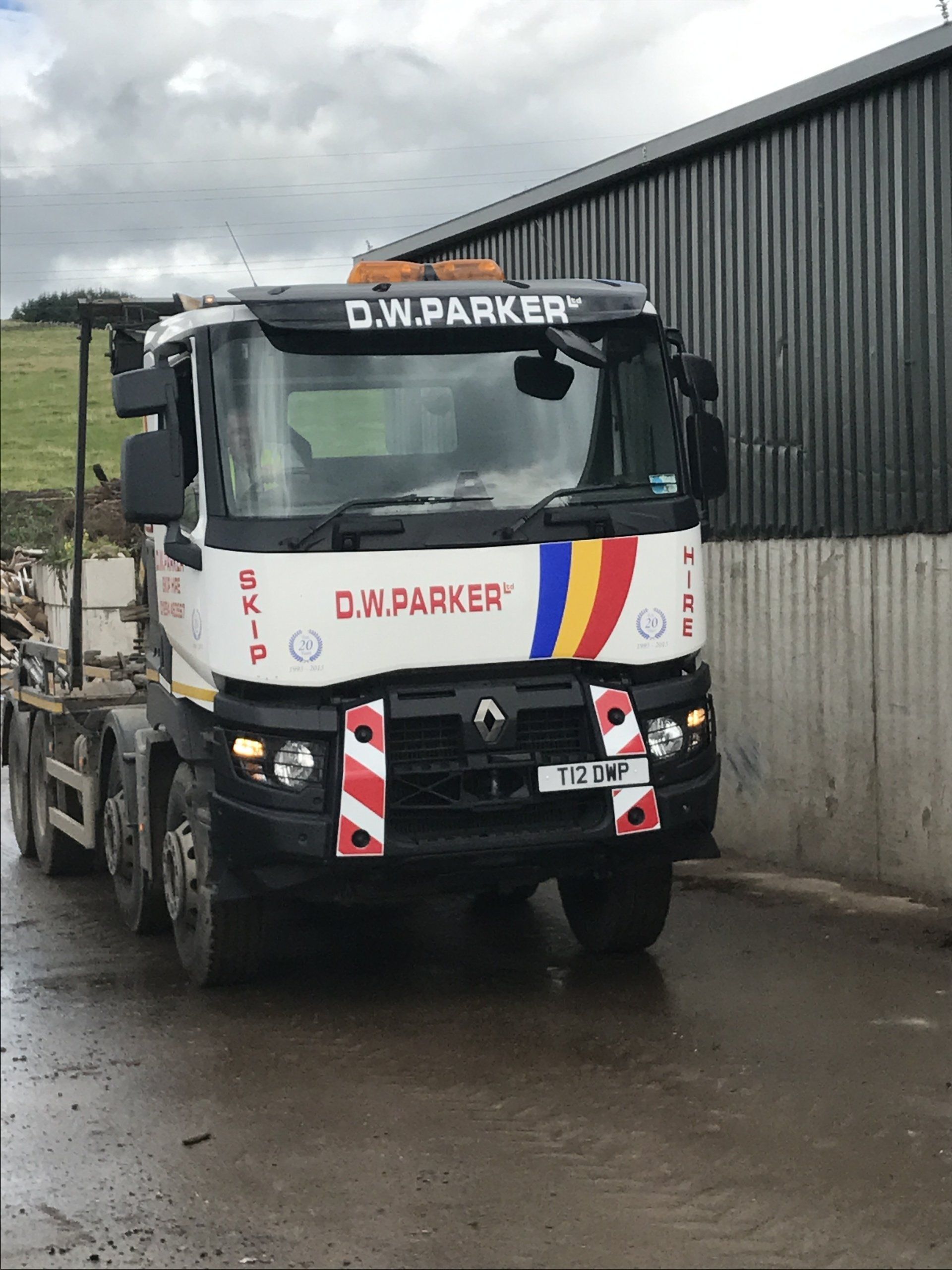 White truck parked by building