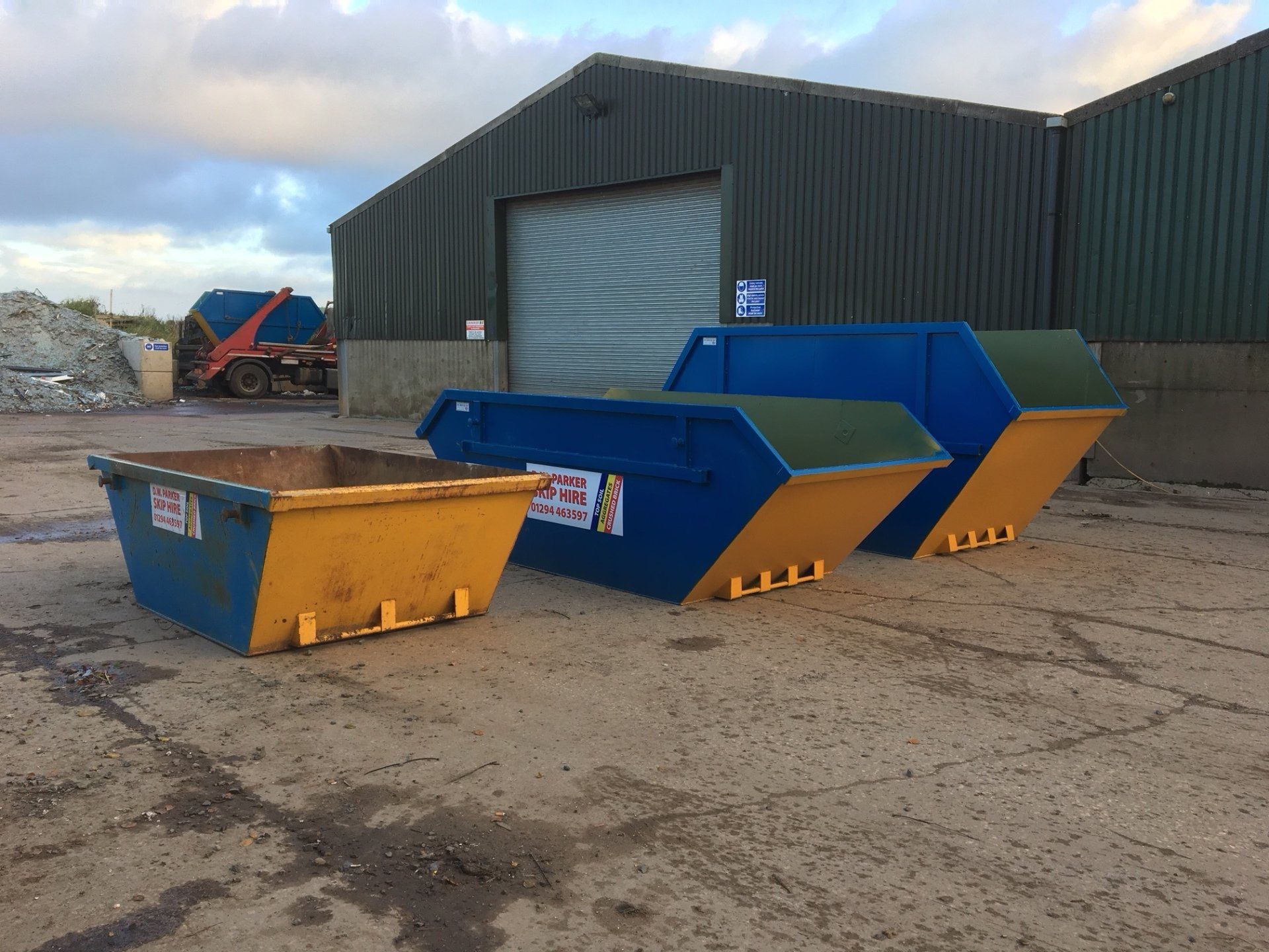 Three skips side by side