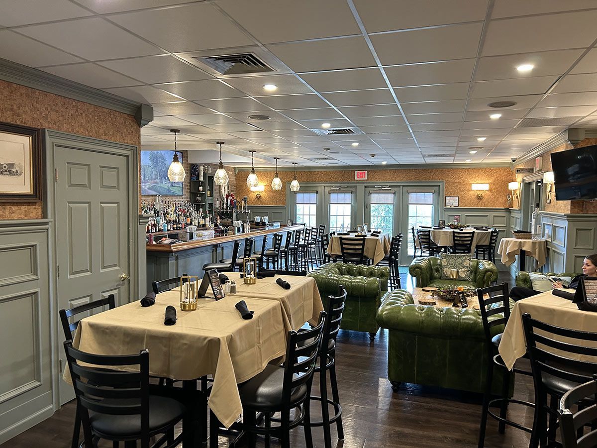 A large dining room filled with tables and chairs.