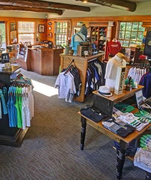 A store filled with lots of shirts and hats