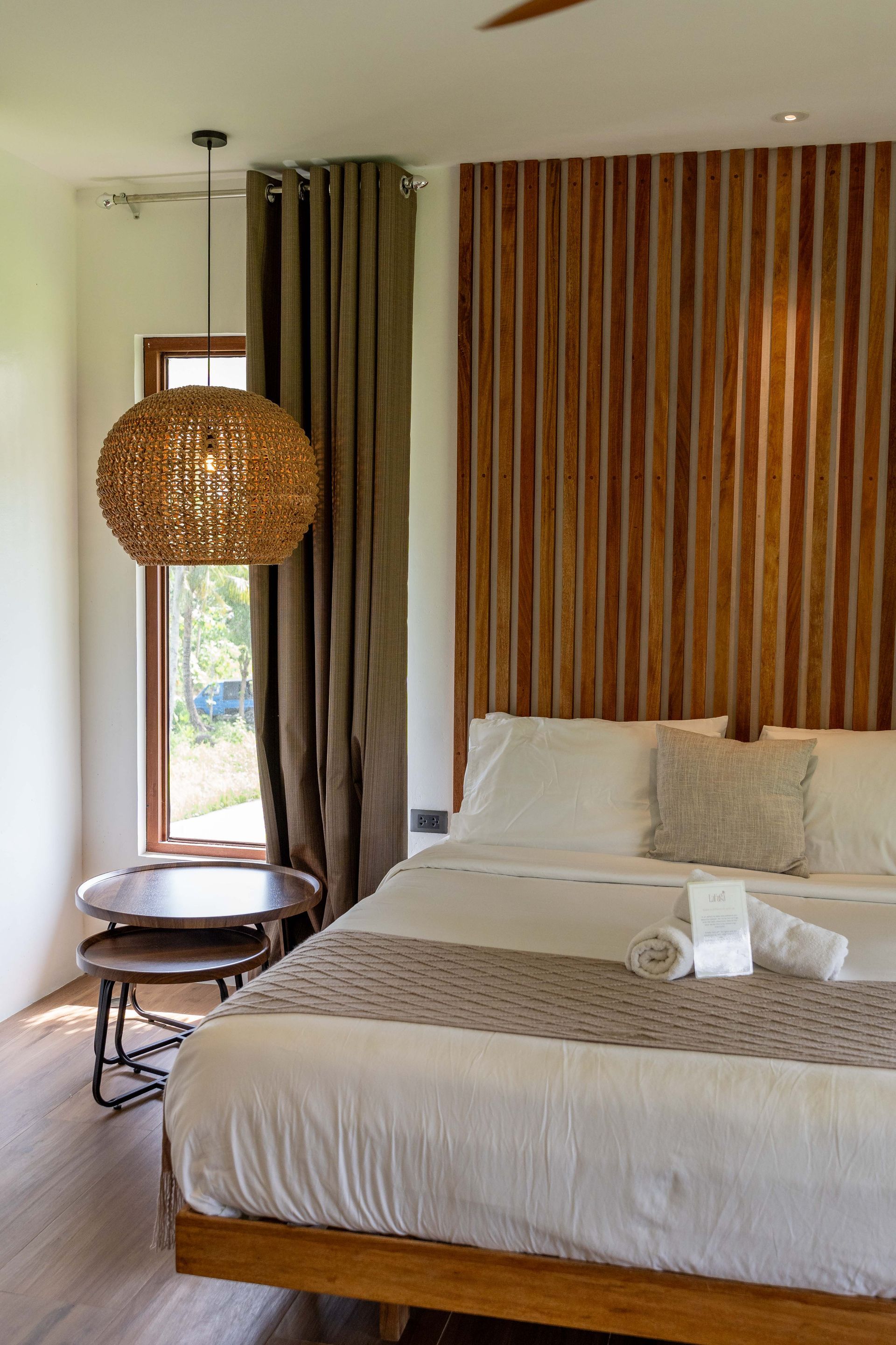 A room with a wooden floor and a sign that says lafuga