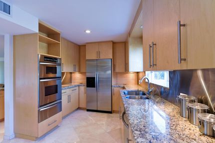 kitchen with marbled countertops