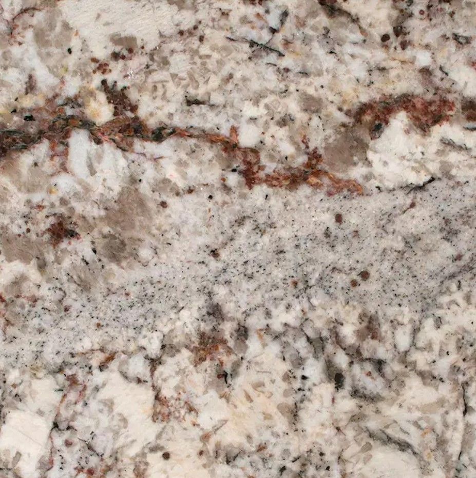 A close up of a white granite counter top