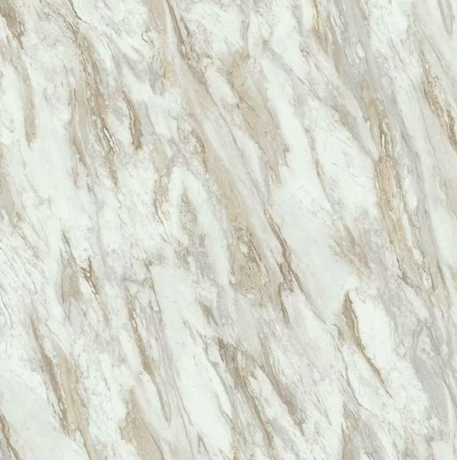 A close up of laminate with a white and brown marble pattern.