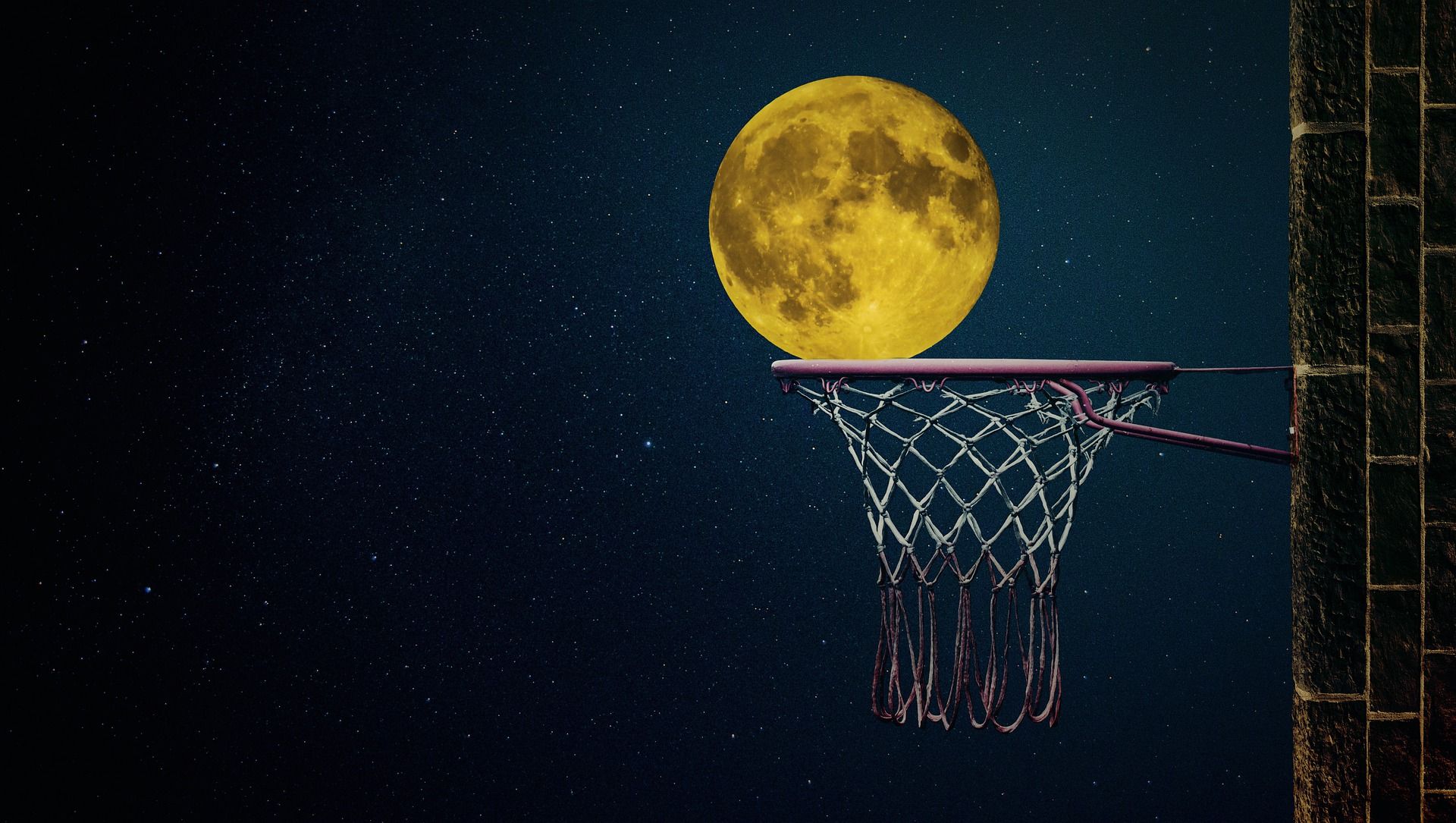 Image of the moon and a basketball hoop