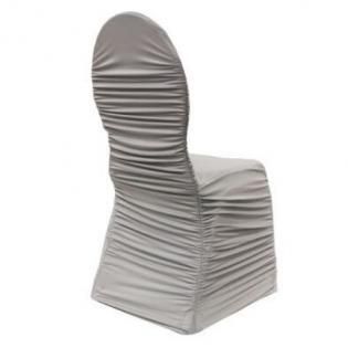 Gray ruched chair cover on a banquet chair against a white background