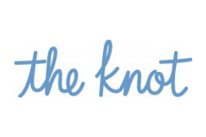 Blue handwritten “the knot” logo on a white background