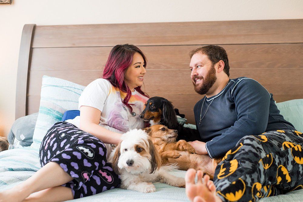 Doctors with pets on the bed - A Couple of Vets